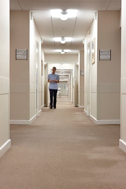 Healthcare - Nurse Walking Down Hallway.jpg